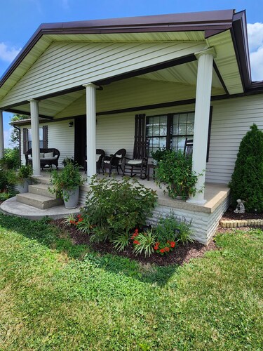 Welcome to our charming farmhouse retreat nestled in the Kentucky countryside.