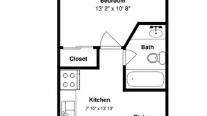 Grundriss eines Hauses mit Balkon, Schlafzimmer, Abstellraum, Küche, Esszimmer, Wohnzimmer, Bad und Veranda.