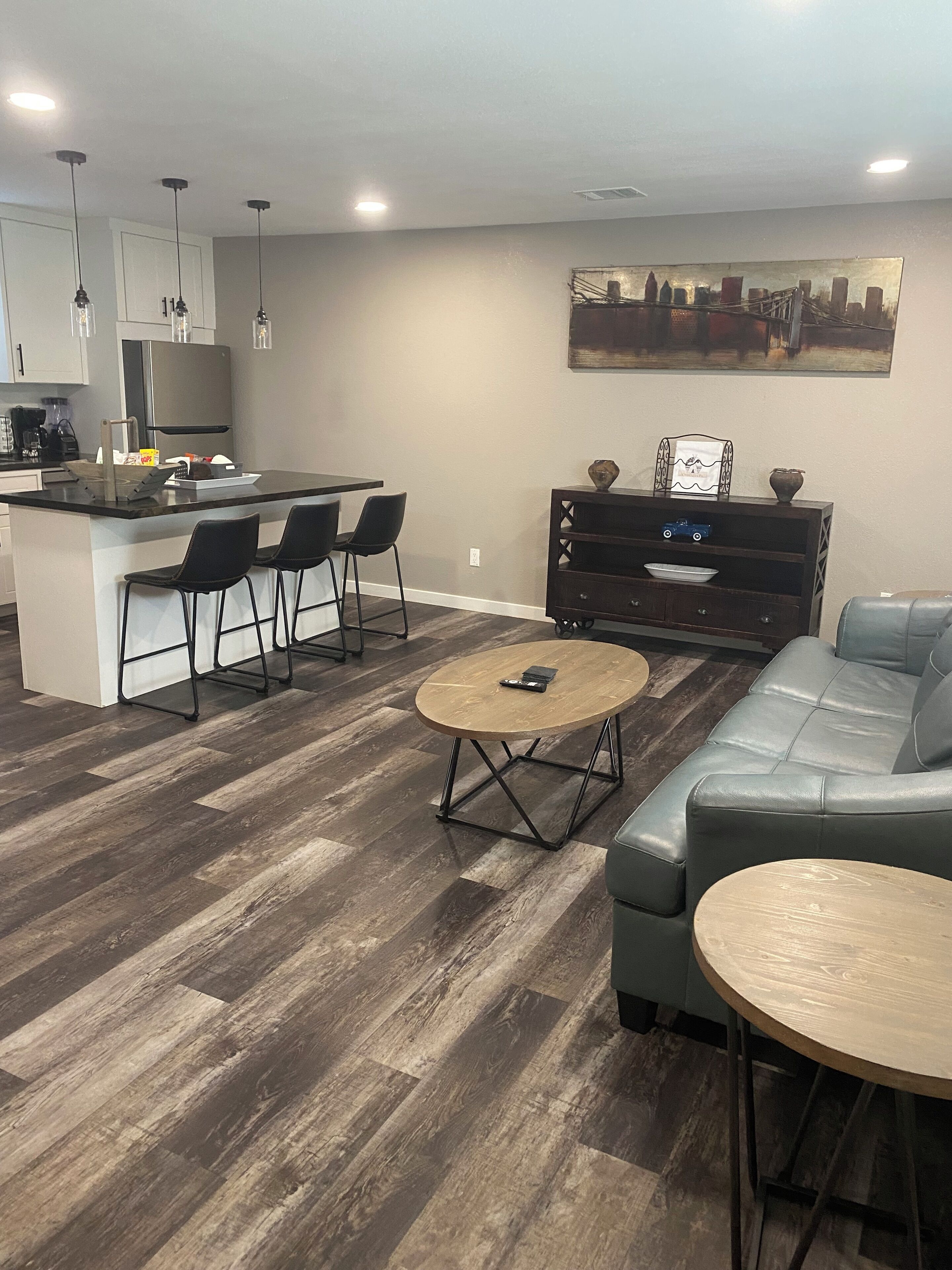 Family Suite, 1 Bedroom | Living area | 50-inch Smart TV with digital channels