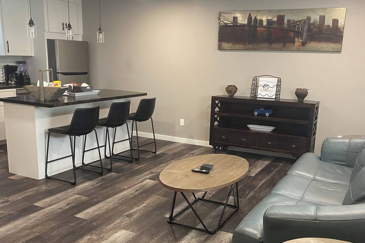 Family Suite, 1 Bedroom | Living area | 50-inch Smart TV with digital channels