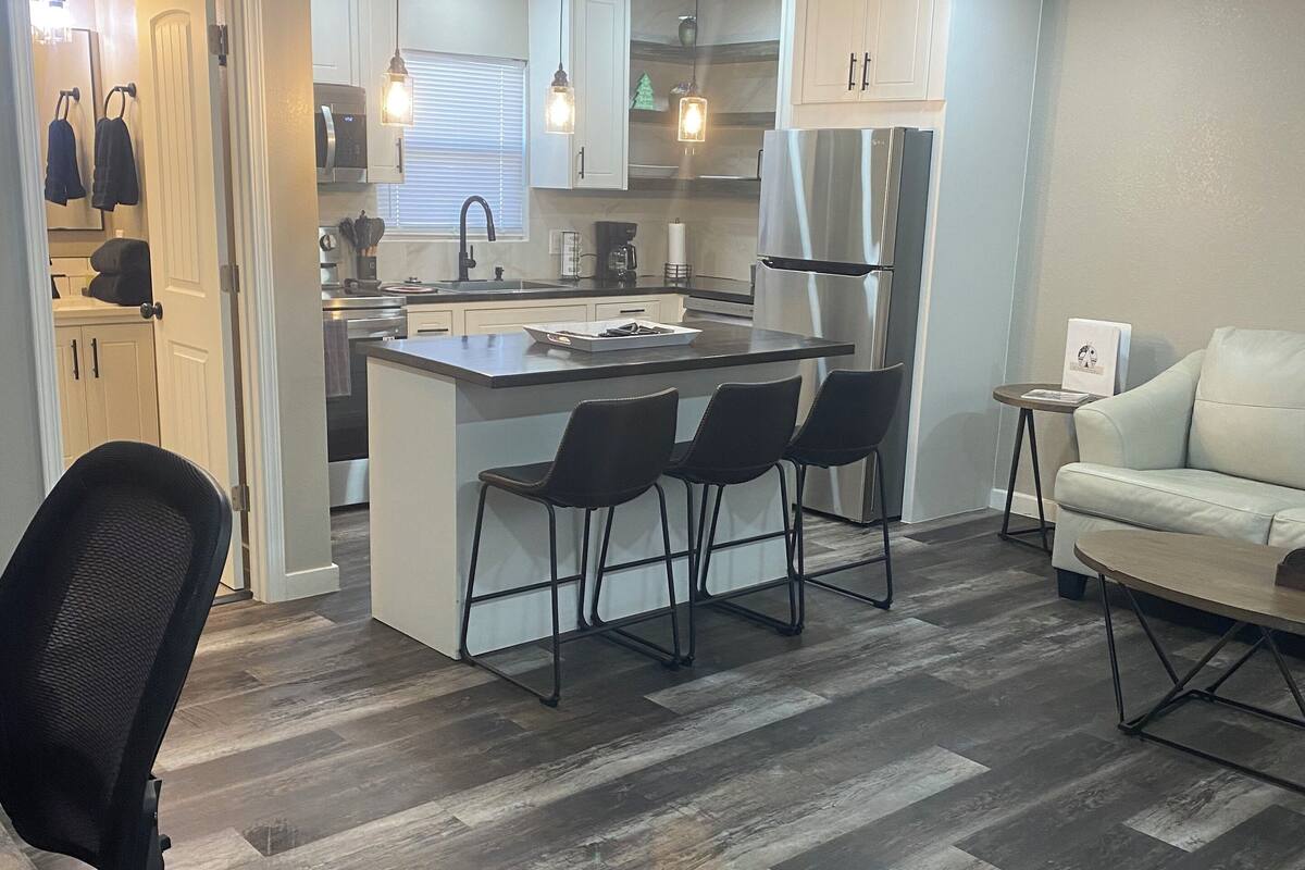 Family Suite, 1 Bedroom | Living area | 50-inch Smart TV with digital channels