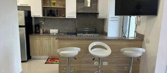 Cozy 2-bedroom condo with WiFi, fitness room and pool in tranquil Boca Chica