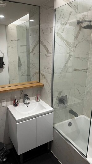 Hair dryer, towels, soap, shampoo