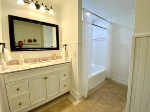 Hair dryer, towels, soap, shampoo