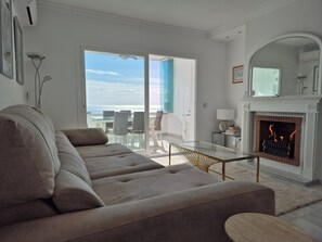 Smart TV, fireplace, DVD player, books