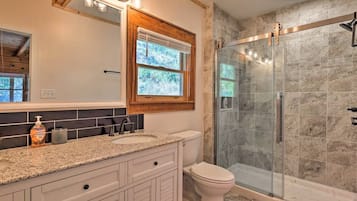 Shower, eco-friendly toiletries, hair dryer, towels
