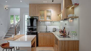 Fridge, electric kettle, highchair, cookware/dishes/utensils