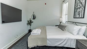 Condo, 1 King Bed, Kitchen, City View (Park Place) | 1 bedroom, individually decorated, individually furnished, bed sheets