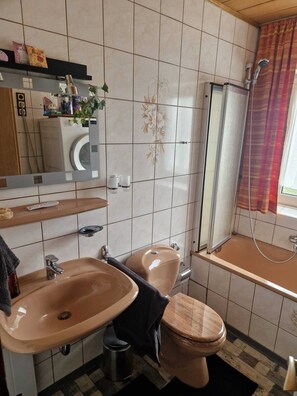 Hair dryer, towels, soap, shampoo