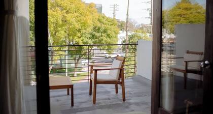 West Hollywood Gem: City Views & Balcony