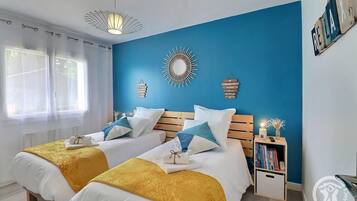 2 dormitorios, tabla de planchar con plancha, wifi gratis y ropa de cama