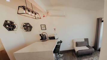 Casa, 2 habitaciones | Área de sala de estar