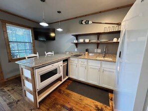 Fridge, microwave, coffee/tea maker, toaster