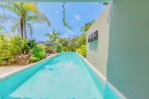 Tropical Retreat Pools Golf Gym 