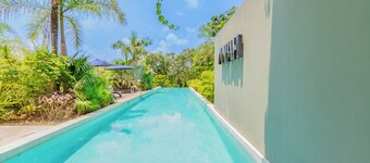 Tropical Retreat Pools Golf Gym 