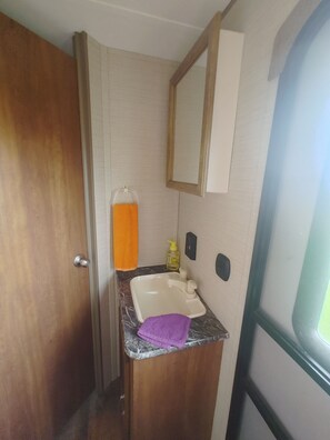 Hair dryer, towels, soap, shampoo