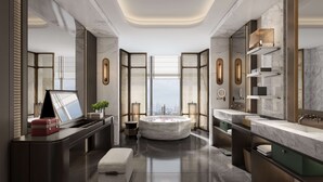 A modern bathroom with a large mirror, a round bathtub, and a vanity with a marble countertop. - Doubletree By Hilton Guang'An (Guang'an)