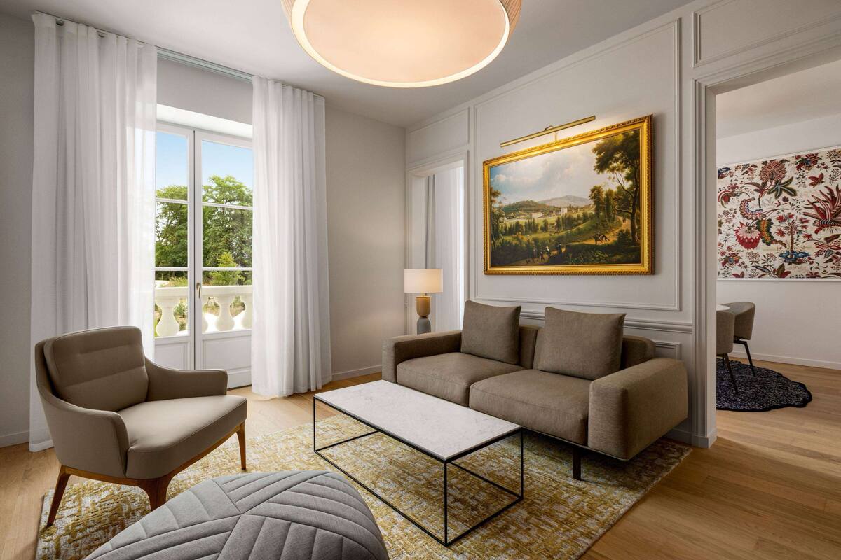A modern living room with a sofa, armchair, and coffee table, a painting on the wall, and a view through a large window.