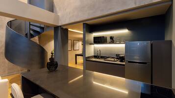 Elite Apartment | Private kitchen | Coffee/tea maker, dining tables