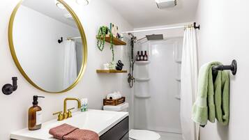 Rainfall showerhead, eco-friendly toiletries, hair dryer, towels