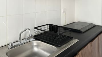 Fridge, microwave, stovetop, cookware/dishes/utensils