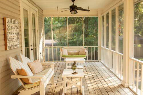 Elegant WATERFRONT home with private boat ramp/dock, elevator, & unmatched view!