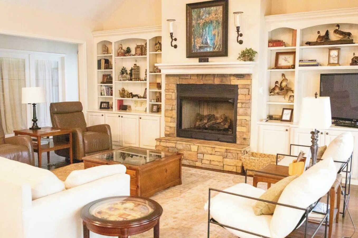 TV, fireplace, books