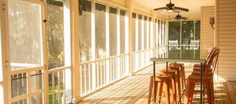 Elegant WATERFRONT home with private boat ramp/dock, elevator, & unmatched view!