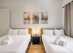 2 slaapkamers, een strijkplank/strijkijzer, reisbedje, gratis wifi