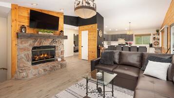 TV, fireplace, books, stereo