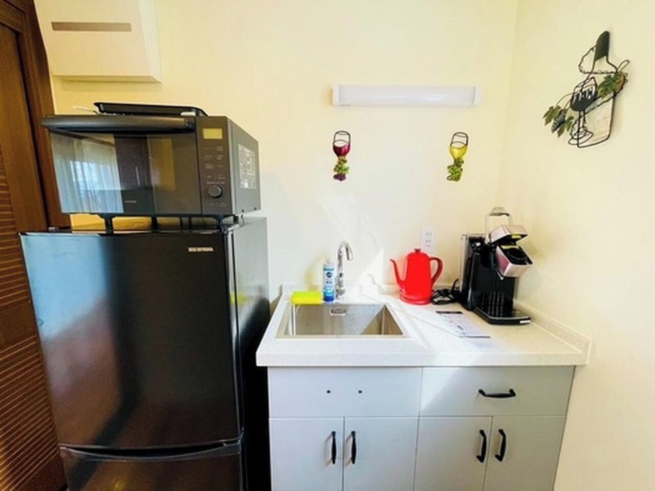 Fridge, microwave, cookware/dishes/utensils