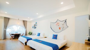 A hotel room with two beds, a round table, and a large window with curtains. - Thuyen Xua Homestay Phu Quy Island (Phu Quy)