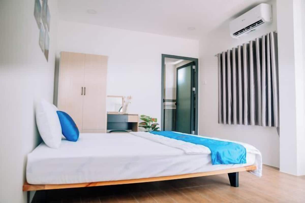 Desk, laptop workspace, blackout drapes, soundproofing