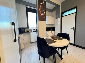 Dining - C&C Studio Apartments (Kampala)