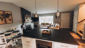 Smart TV, fireplace, books