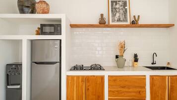 Fridge, microwave, stovetop, coffee/tea maker