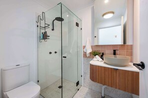 Shower, hair dryer, towels, soap