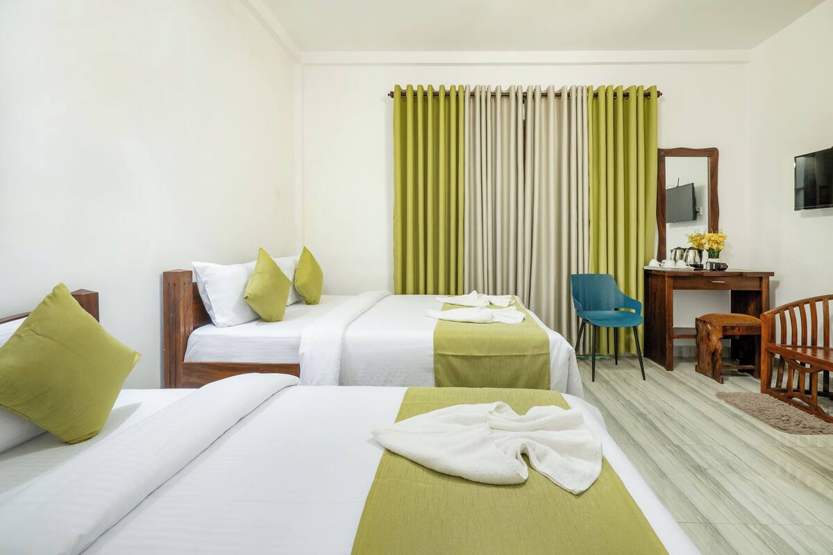 Chambre Triple Deluxe