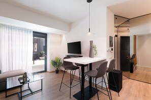 Deluxe Apartment, 1 Bedroom, Jetted Tub, City View | In-room dining - Kosmos Luxury Residences (Athens)