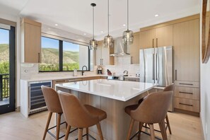 Fridge, microwave, oven, stovetop - One Riverfront Condo 307 (Avon)