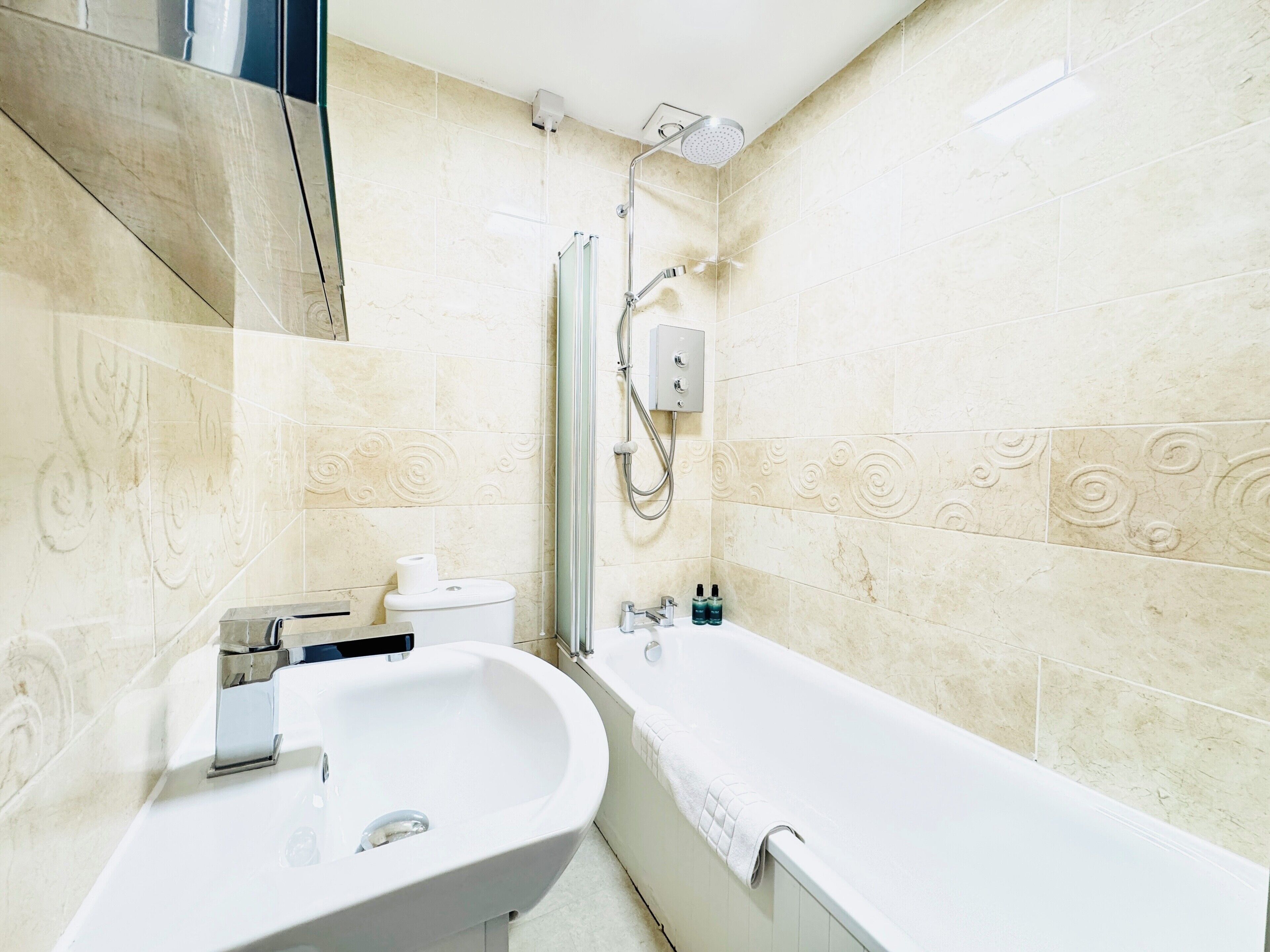 Hair dryer, towels, soap, shampoo