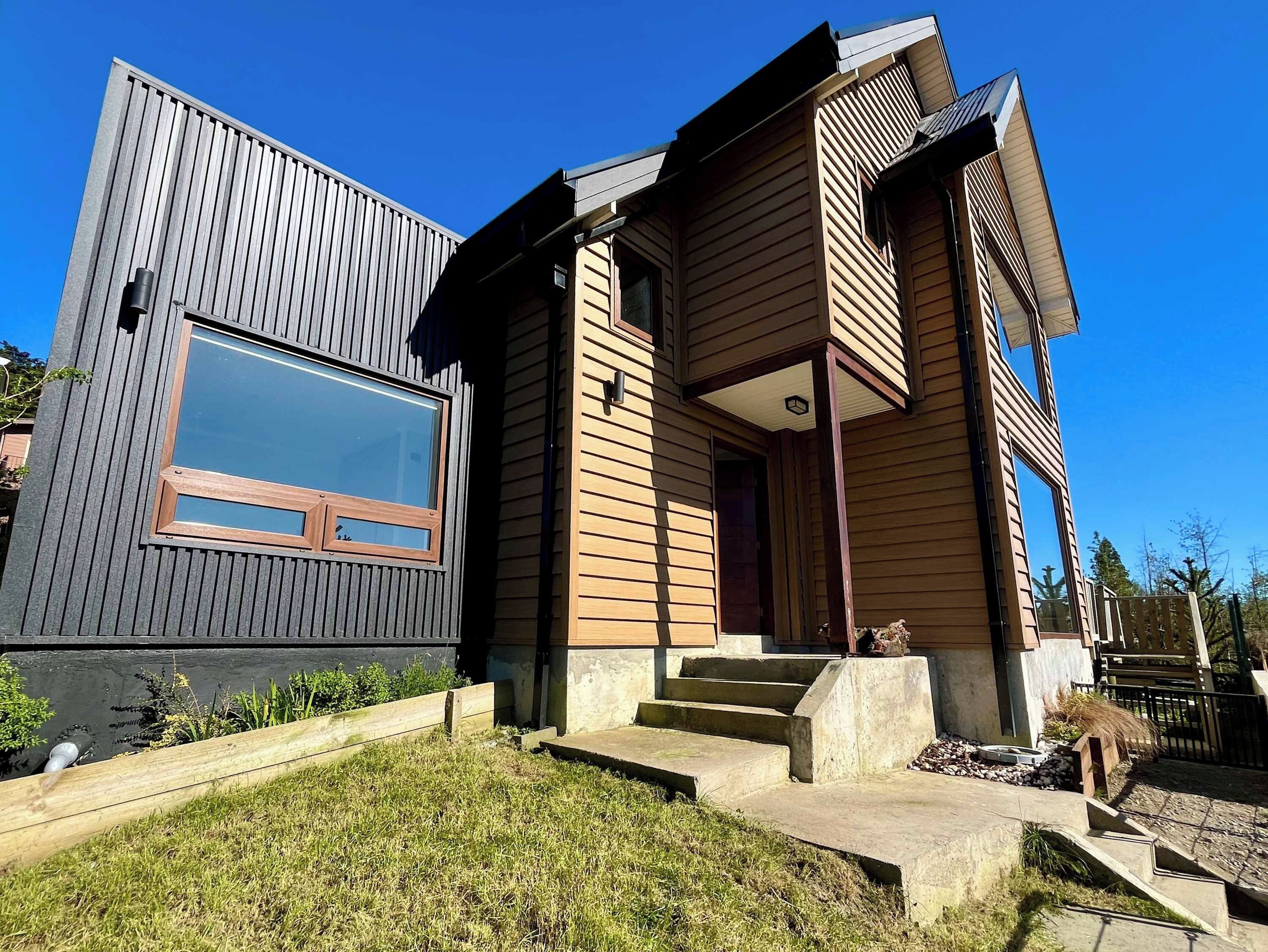 The wood-and-metal house