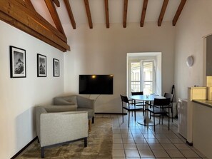 City Apartment, City View | Living area | Flat-screen TV - Apartments in the old city Piazza Grande (Locarno)