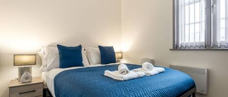 1 غرفة نوم ومكواة/لوح كي وواي فاي وملاءات أسرّة