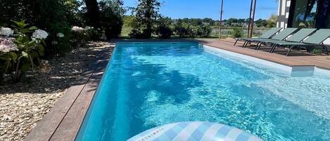 Piscina all'aperto, una piscina riscaldata