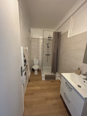 Hair dryer, towels, soap, shampoo
