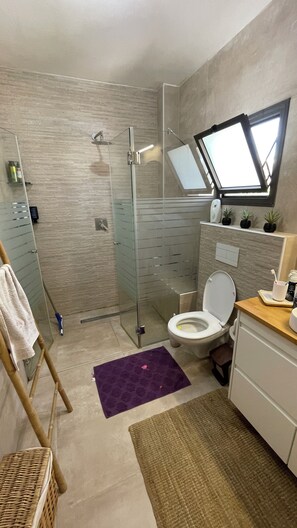 Hair dryer, towels, soap, shampoo