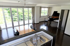 Basic Suite, Beach View | Living area | Flat-screen TV - Another Sky Ishigaki Island (Ishigaki)