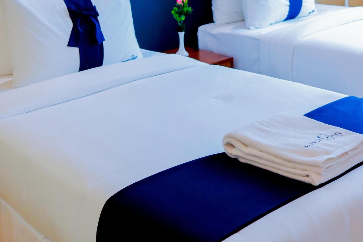 Deluxe Room, 2 Twin Beds, Non Smoking (View) | Egyptian cotton sheets, premium bedding, pillowtop beds, in-room safe