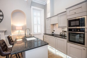 Appartement | 1 chambre, fer et planche Ă repasser